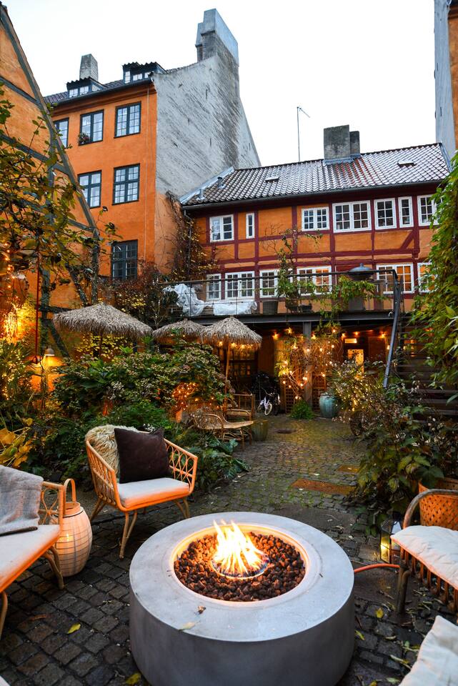 outdoor gas firepit in a copenhagen garden 