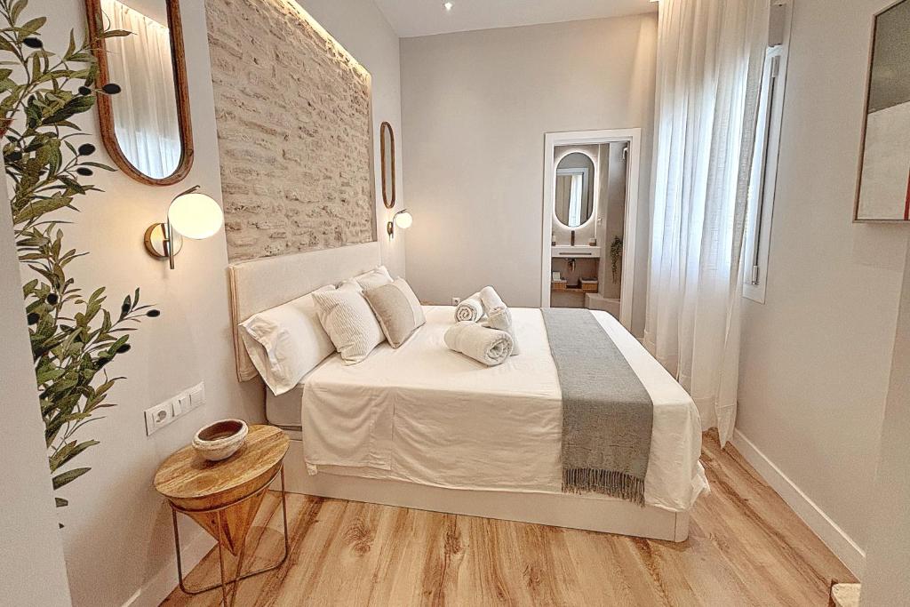 scandi style master bedroom Aljara suites Ronda