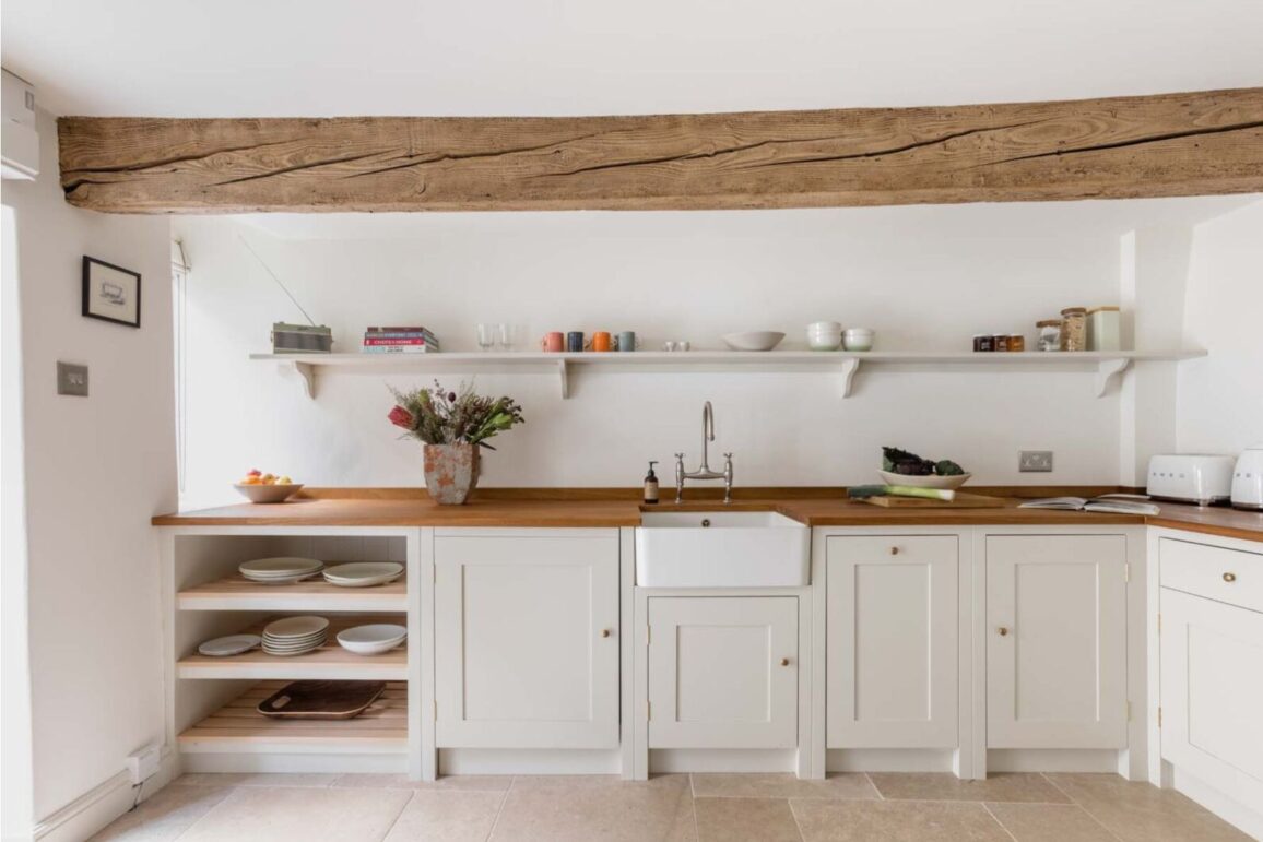 Scandinavian white kitchen in a cotswald cottage